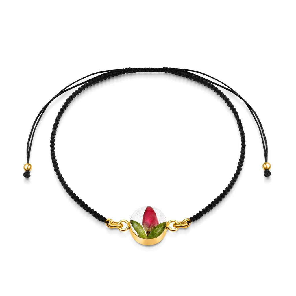 Flower bracelet | Black woven bracelet with gold-plated flower charm by Shrieking Violet®