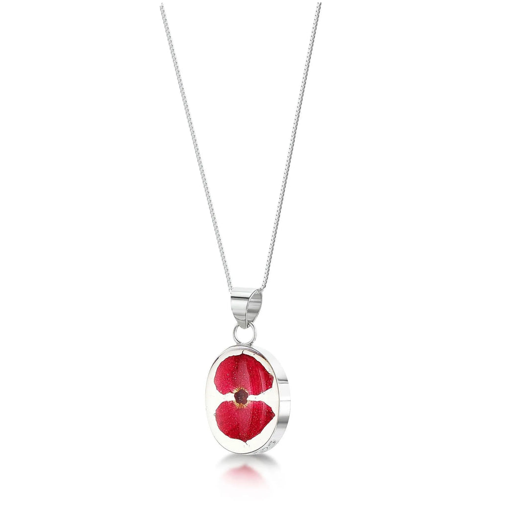 Poppy necklace by Shrieking Violet® Sterling silver oval pendant handmade with a single mini poppy (Euphorbia milii).