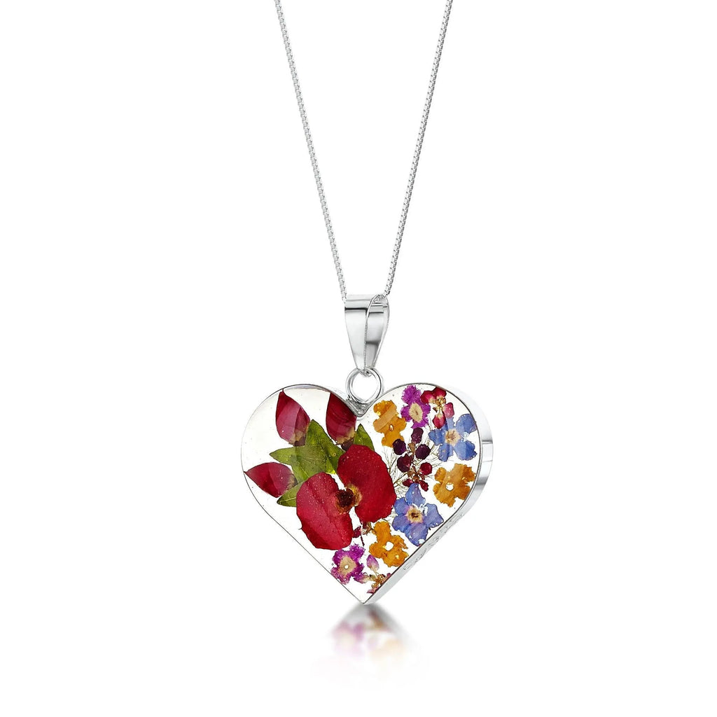 Real flower heart necklace by Shrieking Violet Sterling silver pendant handmade with real flowers. Cool gift for nature lovers.