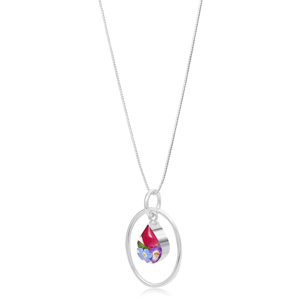 Real flower necklace by Shrieking Violet® Sterling silver oval pendant with real flowers & silver oval surround. Stylish gift for nature lovers.