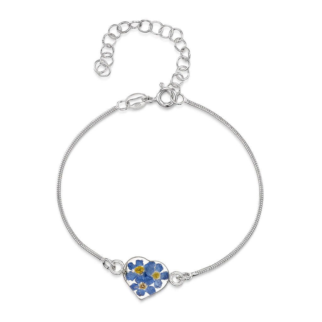 Sterling silver snake chain bracelet with a handmade charm with real forget-me-not flowers set into resin.